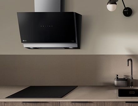This is an image of LG built-in induction hob and hood installed in the kitchen.