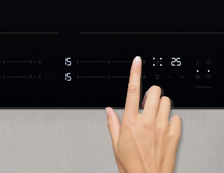 This image is touching the control panel of the induction hob.