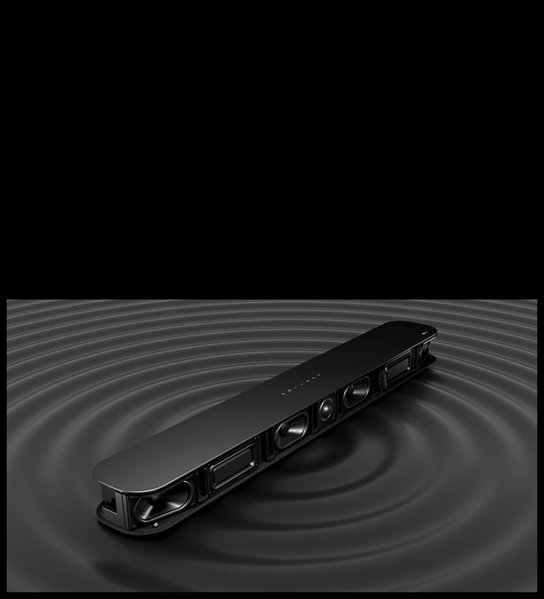 Image of 4 passive radiators placed inside of Soundbar . Underneath the Soundbar  circled black waves are shown for illustraing its powerful bass sound.