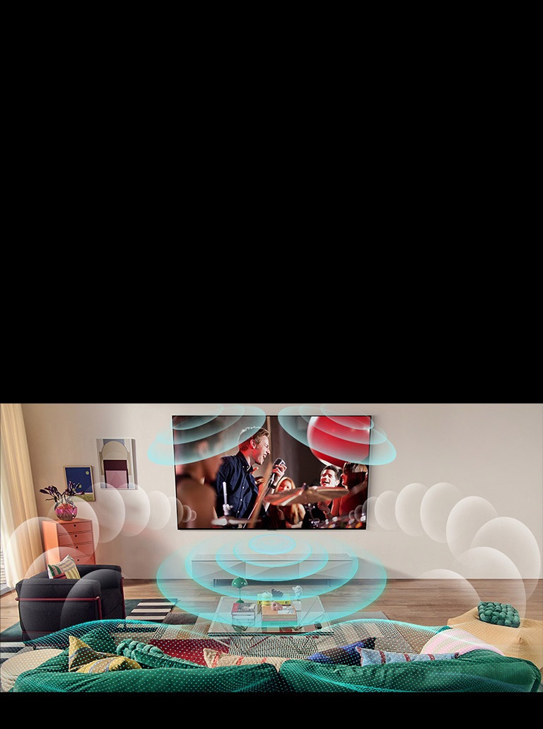 Uma imagem de uma TV LG OLED em uma sala mostrando um concerto musical. Bolhas representando o som surround virtual preenchem o espaço.