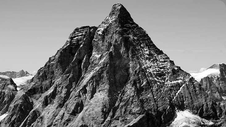 A black&white image of a mountain with 2000:1 contrast ratio to show deeper black color than 1000:1 ratio.