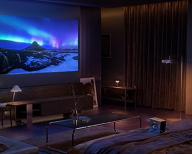 Imagen del Cinebeam Q descansando sobre una cama oscura, proyectando una pantalla de aurora azul.