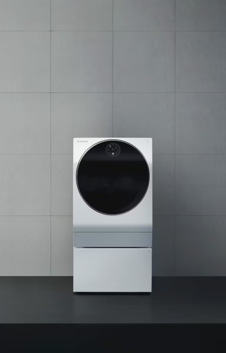 LG SIGNATURE Washing Machine is placed on the floor with a big wall.			