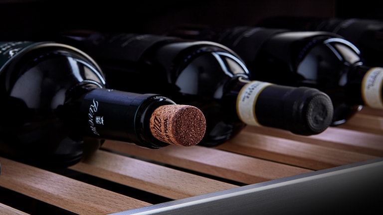 Wines are placed on the LG SIGNATURE Wine Cellar.