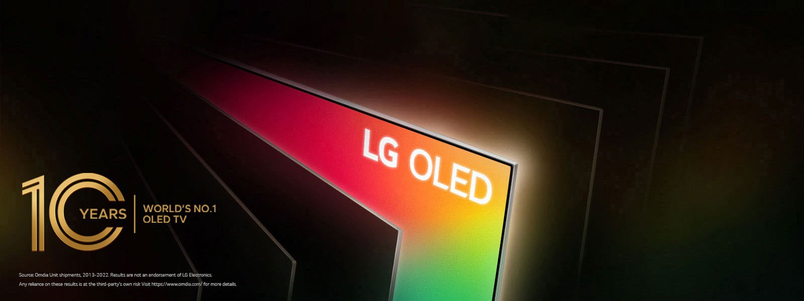 An angled bird's eye view of a row of televisions spanned out like the pages of a book. All the televisions are black, except one filled with bright colors and the words "LG OLED."