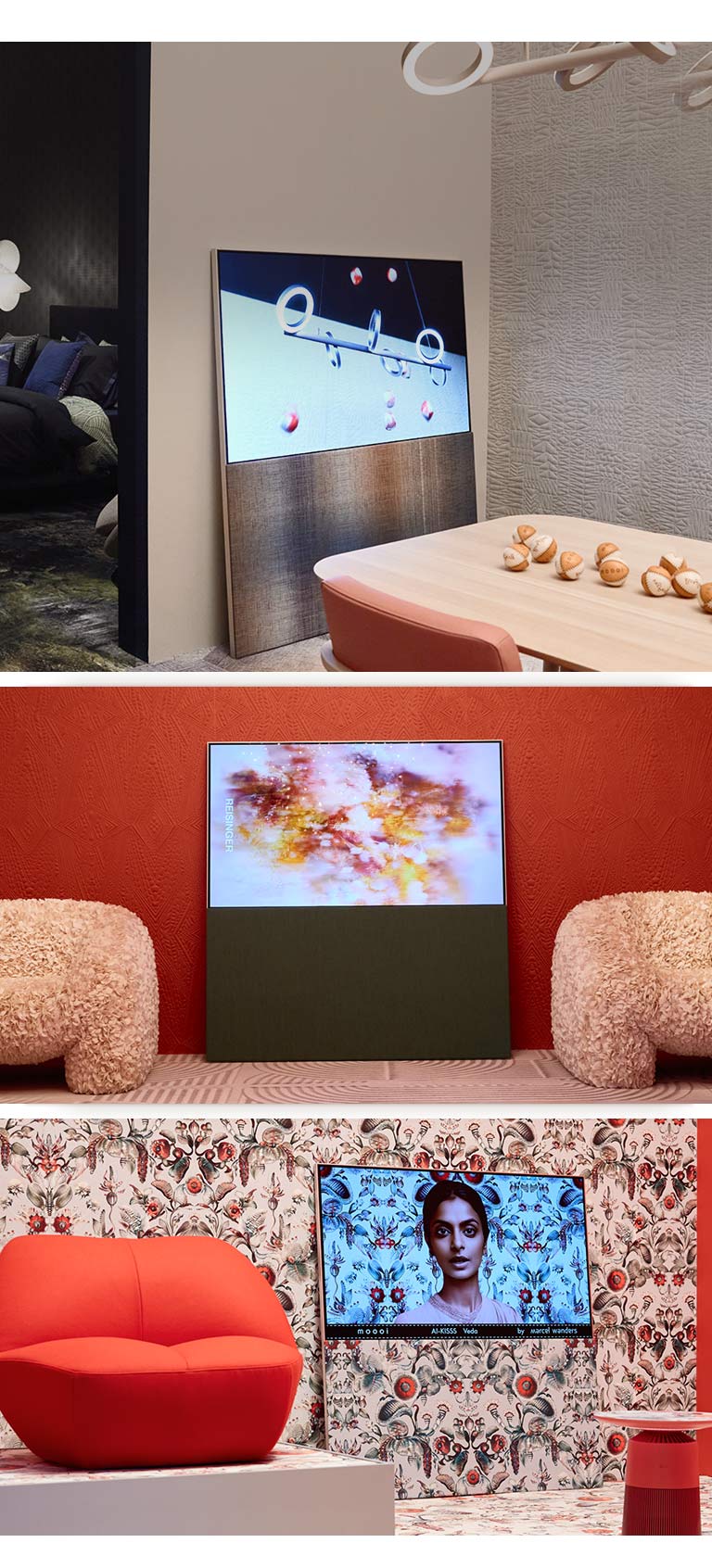 Op de bovenste afbeelding is een Easel te zien die tegen een muur leunt in een kamer met neutrale kleuren en een abstract kunstwerk met honkballen op het scherm. Tegenover de tv staat een houten tafel waar ook honkballen op liggen. 	 Op de afbeelding rechtsonder is een Easel te zien die leunt tegen een muur met een helder bloemenpatroon in rode en groene kleuren. Op het scherm is een afbeelding zichtbaar van een vrouw tegen dezelfde achtergrond als de muur eromheen. De standaard met stoffen textuur heeft hetzelfde patroon. Er staat een rode eenpersoonsbank naast de tv. Op de afbeelding linksonder is een Easel te zien die leunt tegen een getextureerde muur met terracottakleuren. Een abstract rode, oranje en paarse afbeelding vult het scherm. Er staan beige getextureerde eenpersoonsbanken aan beide zijden van de tv.