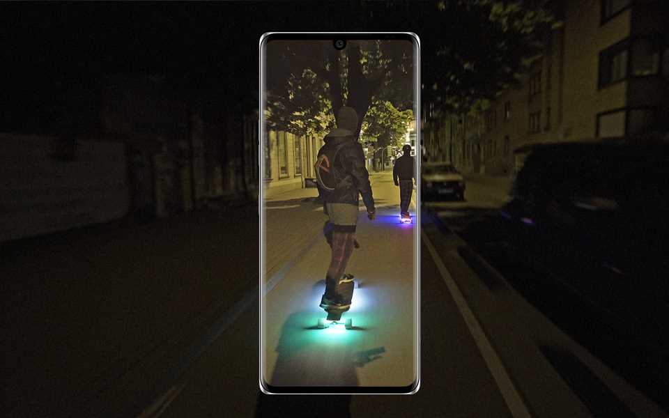A man skateboarding at night captured on the LG VELVET