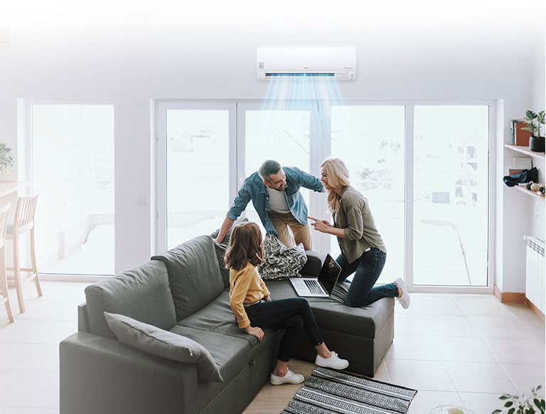 An image of a family having a good time in a living room.