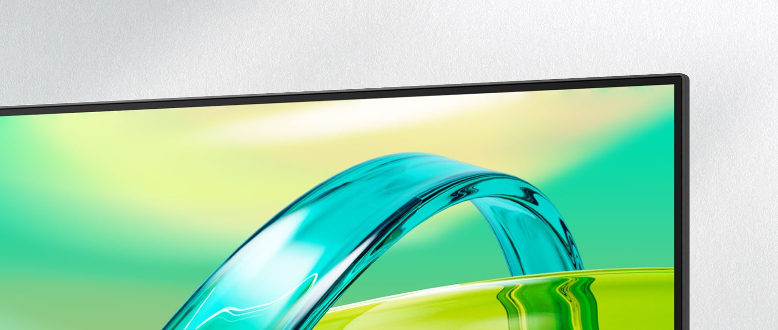LG FHD monitor displays a green and yellow gradient background with a translucent curved object floating across the screen.