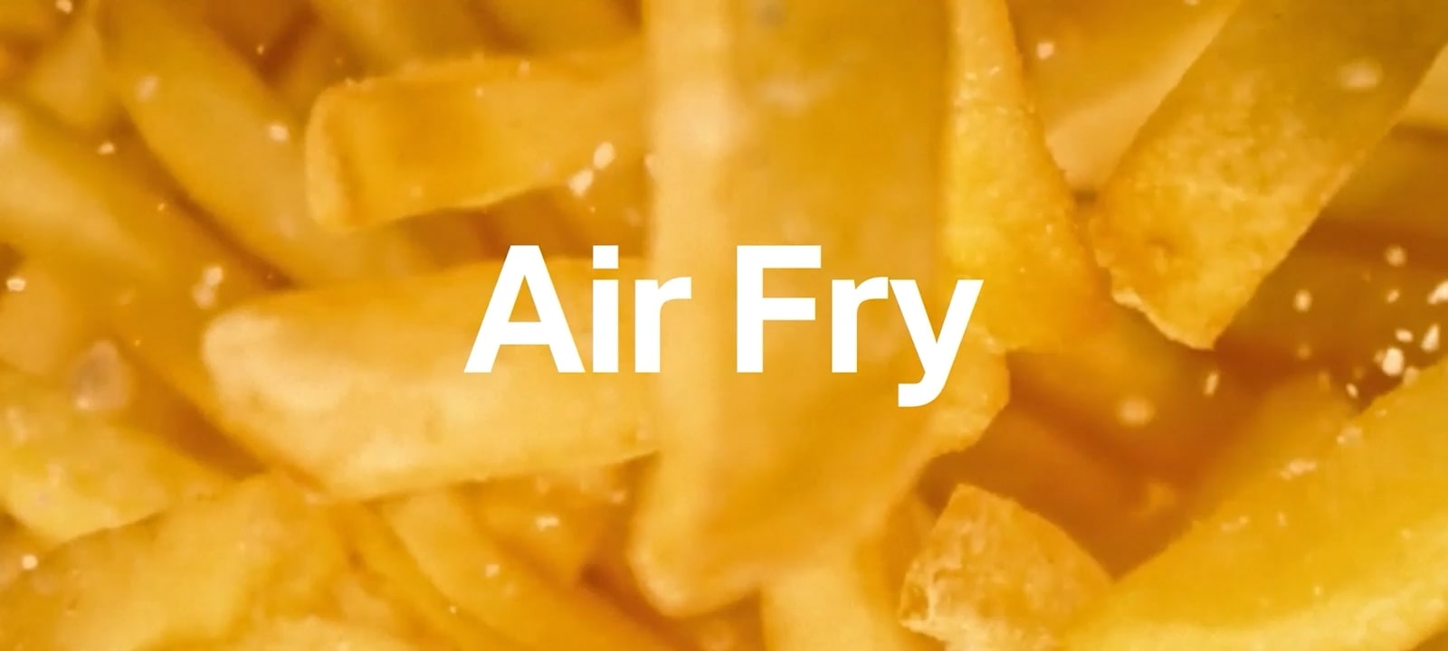 The image shows golden fries up close, with the bold text “Air Fry” in the center—indicating Air Fry function.