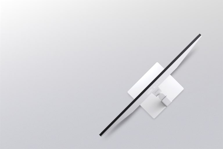 A side view of a white monitor illustrating ergonomic adjustments, including tilt, height, and swivel capabilities.	