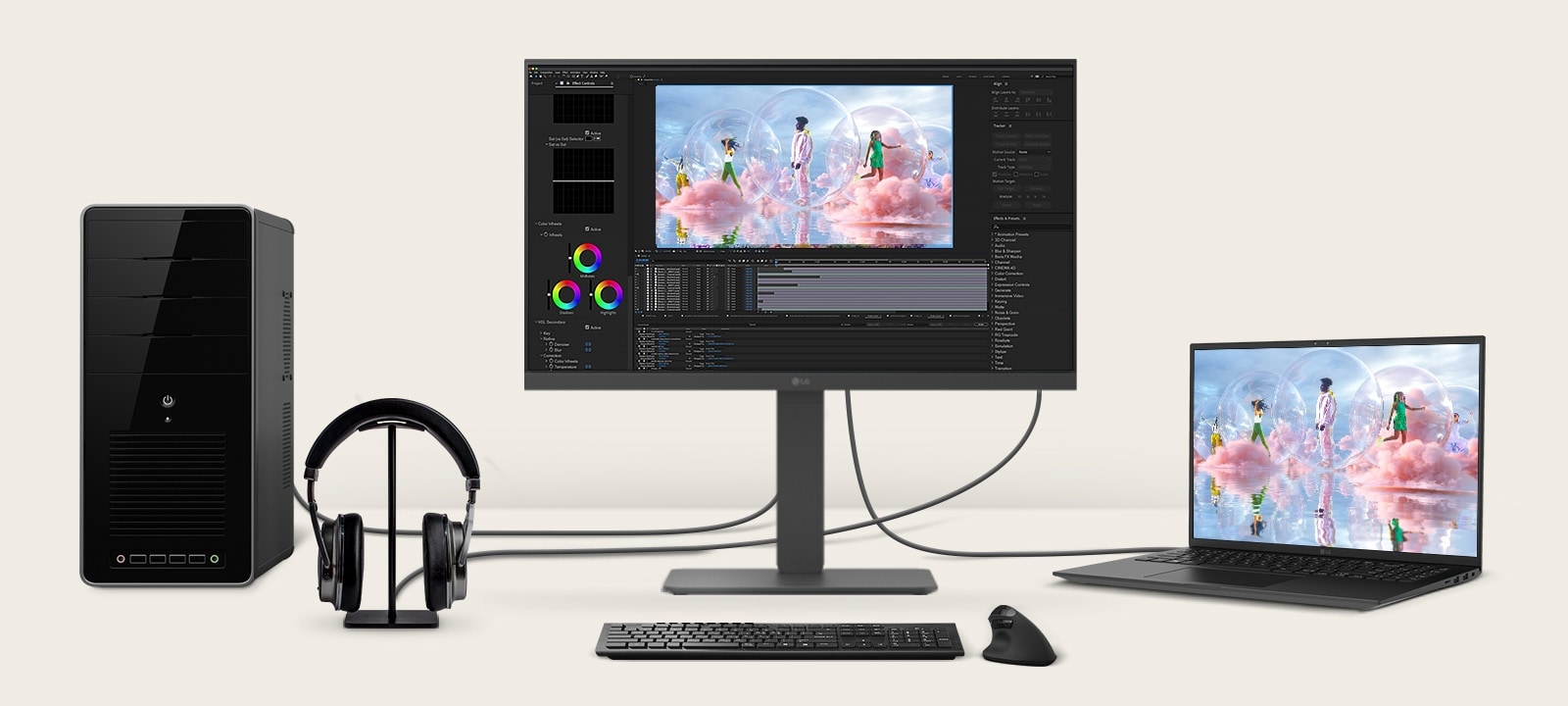 Front view showing a workstation with multiple devices connected to monitors.	