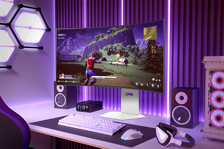 Curved gaming monitor displaying an action-adventure game in a vibrant gaming setup with purple lighting and a PC tower nearby.