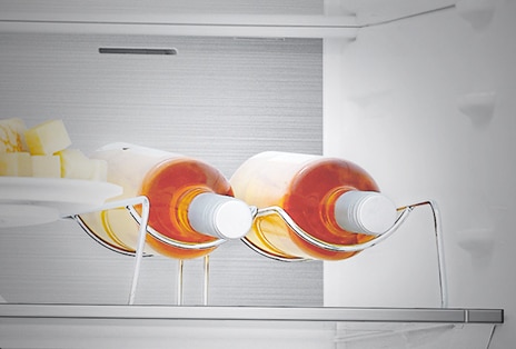 Close-up of wine stand with 2 bottles, enabling efficient use of space.