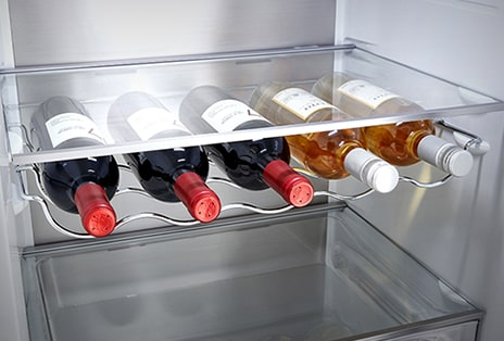 Close-up of wine rack with 5 bottles, enabling efficient use of space.