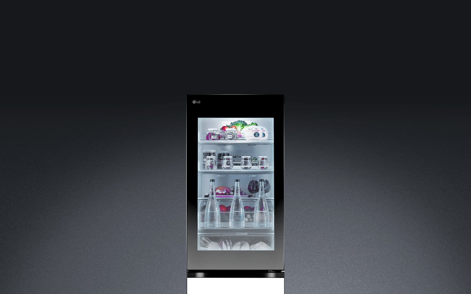 The lg refrigerator door is knocked on twice, and the insta view light turns on, revealing the food items inside without opening the door.