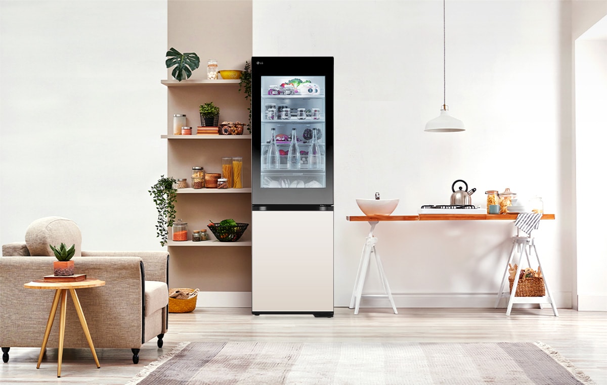 lg bottom freezer with instaview in a white modern kitchen.