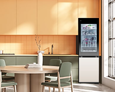 lg bottom freezer with instaview in orange colored modern kitchen.