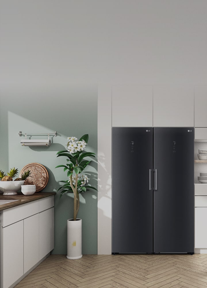 The front view of the refrigerator and freezer or shown fitting in seamlessly in a modern kitchen.