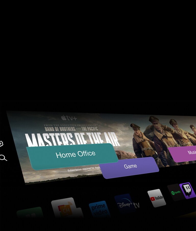 LG OLED TV showing the buttons Home Office, Game, and Music over a banner for Masters of the Air zooms out to show the TV mounted on a wall in a living room. The following logos are displayed on the TV screen in the image: LG Channels, Netflix, Prime Video, Disney TV, Apple TV, YouTube, Spotify, Twitch, GeForce Now and Udemy.