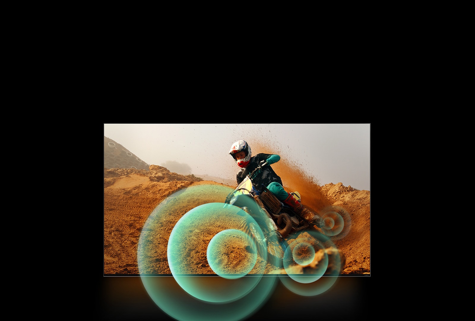 A man riding a motorbike on a dirt track with bright circle graphics around the motorbike.