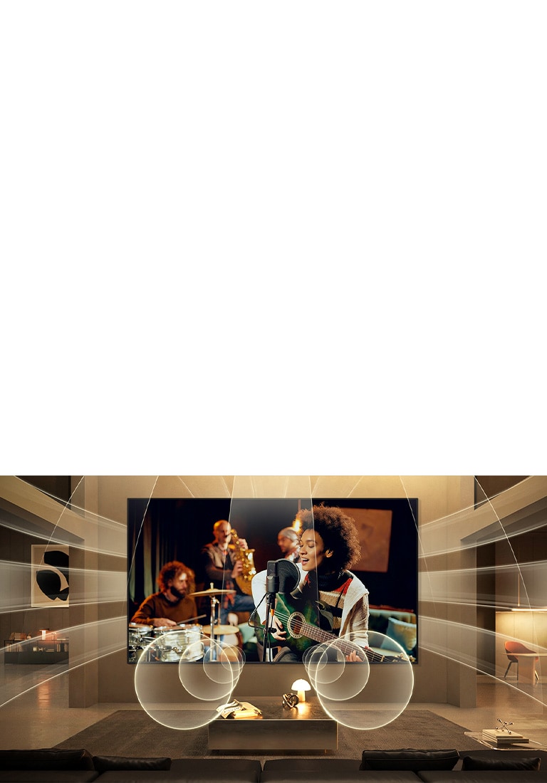 LG Micro RGB evo AI MRGB95 with Virtual 11.1.2 Ch fills a living room as a live music performance plays on screen, delivering multi-directional audio that surrounds the room and heightens immersion throughout the space. 