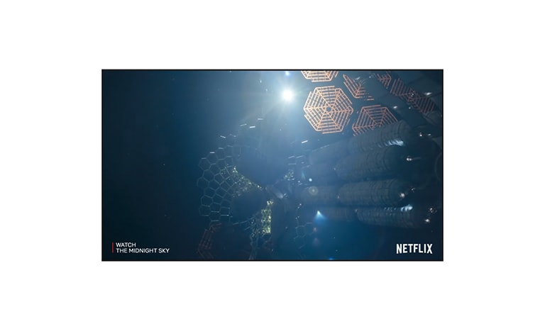 A TV screen showing a trailer of The Midnight Sky on Netflix (play the video).