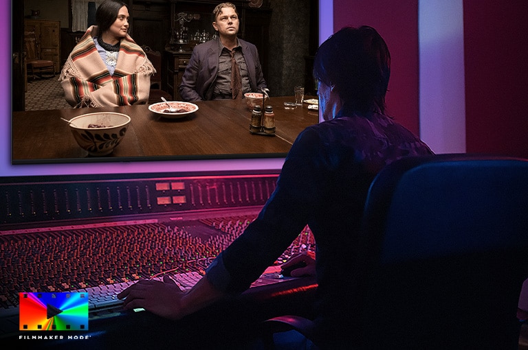 LG NANO 4K UHD AI NU85 is shown in a studio as a director edits a movie at a control panel, with the FILMMAKER MODE logo displayed at the bottom left.