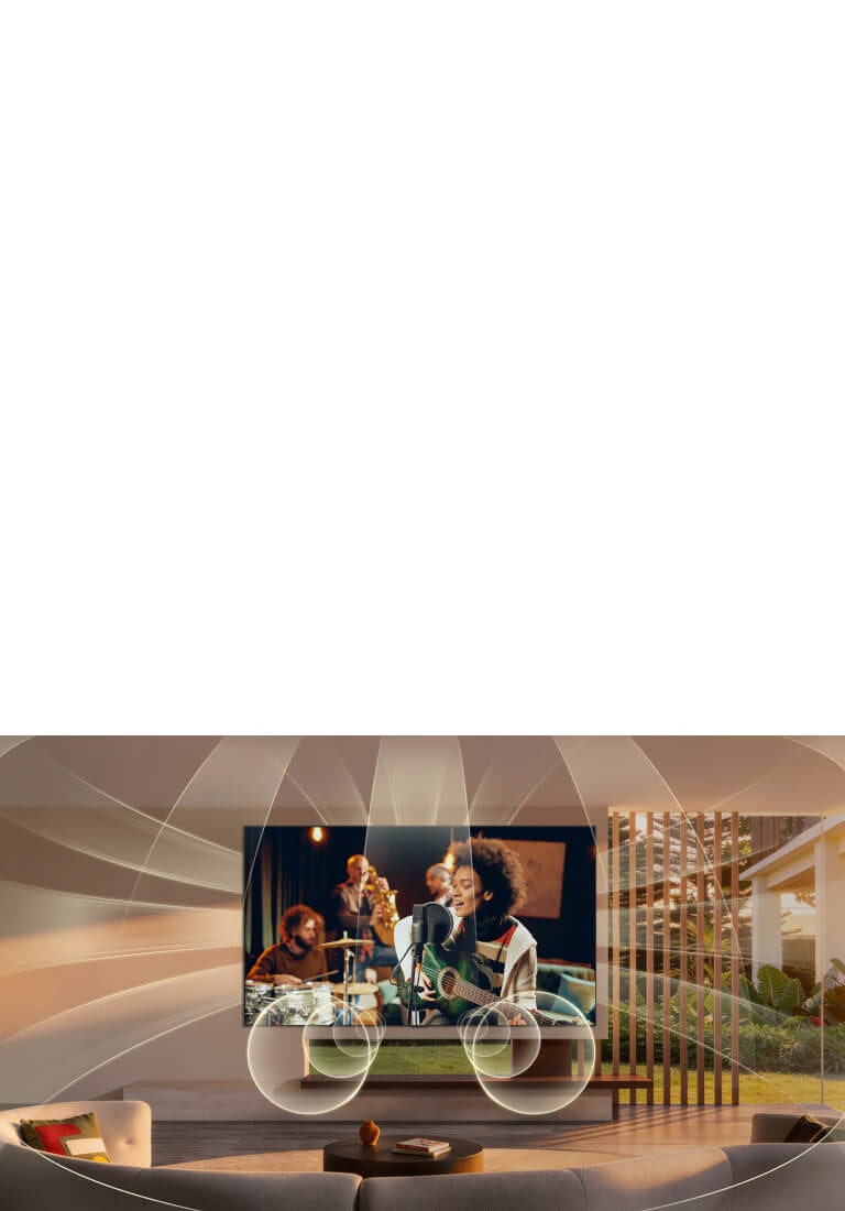 LG OLED evo AI C6 with Virtual 11.1.2 Ch fills a living room as a live music performance plays on screen, delivering multi-directional audio that surrounds the room and heightens immersion throughout the space.