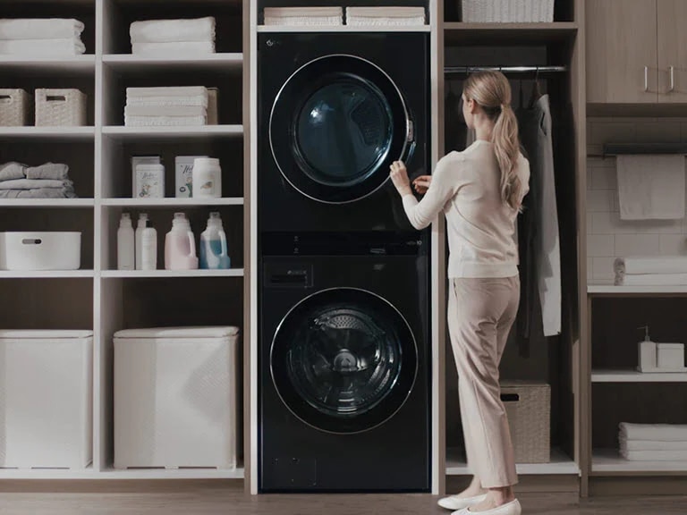 A woman is manipulating a product panel about the height of a waist.