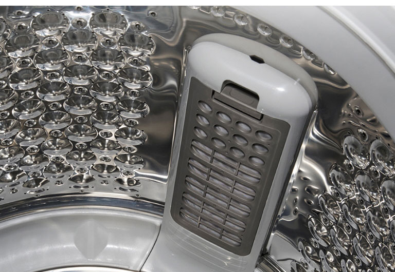 A image shows the interior of the drum with focus on the stainless steel and lint filter design.