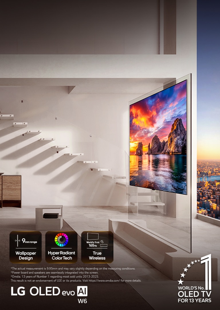 LG OLED evo AI W6 Wallpaper TV is installed in a living room with city views, showing a vivid sunset coastal scene with on-screen icons reading “9mm-class thin Wallpaper Design,” “Hyper Radiant Color Tech,” and “World’s First 165Hz True Wireless.”