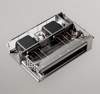 Internal view of static ducted unit showing dual fans, motor, and copper coil layout.