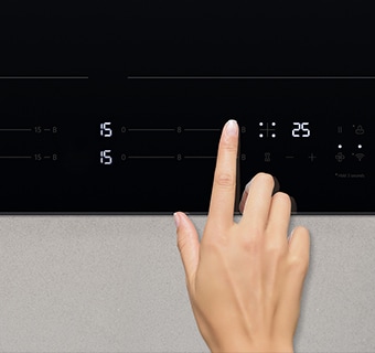 This image is touching the control panel of the induction hob.