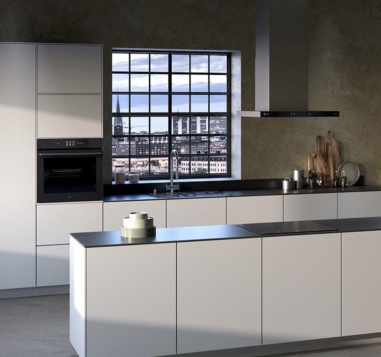 This is an image of the kitchen interior with an LG built-in oven, hood, and induction hob installed.