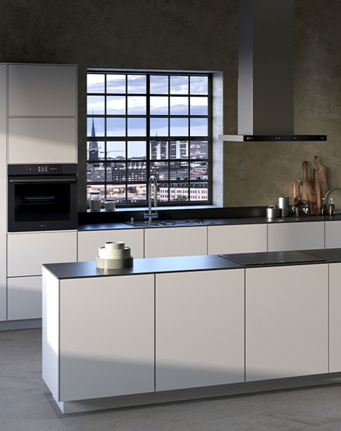 This is an image of the kitchen interior with an LG built-in oven, hood, and induction hob installed.