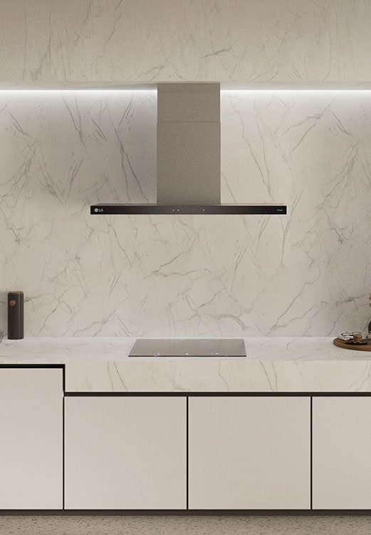 This is an image of the kitchen interior with an LG built-in oven, hood, and Induction hob installed.