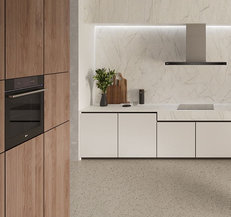 This is an image of the kitchen interior with an LG built-in oven, hood, and Induction hob installed.