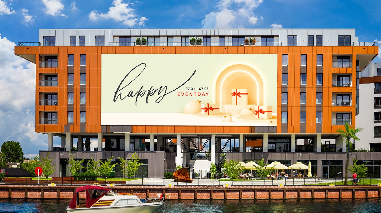 A large LED is installed on the 6th floor exterior wall of a building. Even in the strong sunlight, the screen’s contents are clearly visible.