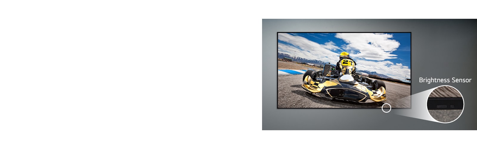 A UL5Q-E is mounted on the wall, with a close-up of the brightness sensor located on the lower front of the display.