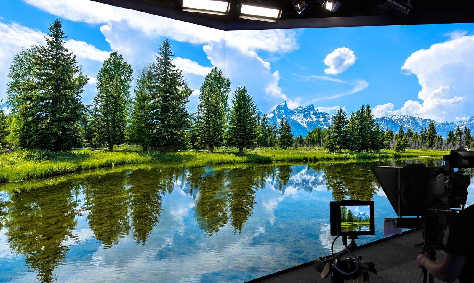 LEDs on the wall and floor vividly show the landscape and a camera is capturing the scene.