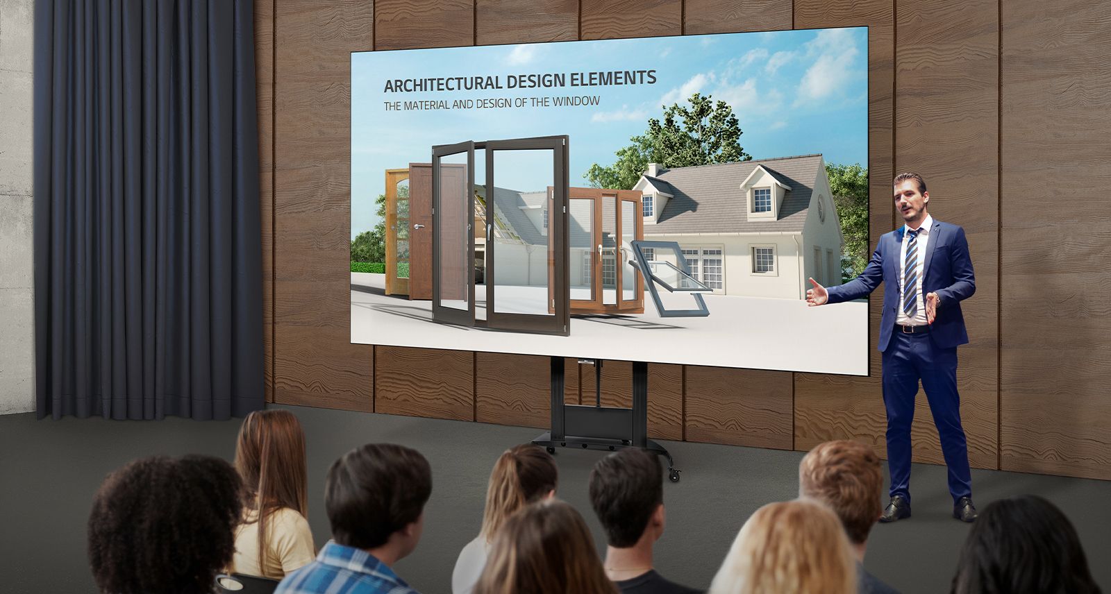 A man explains content on the screen of an LAEC installed with a dedicated stand in an auditorium.