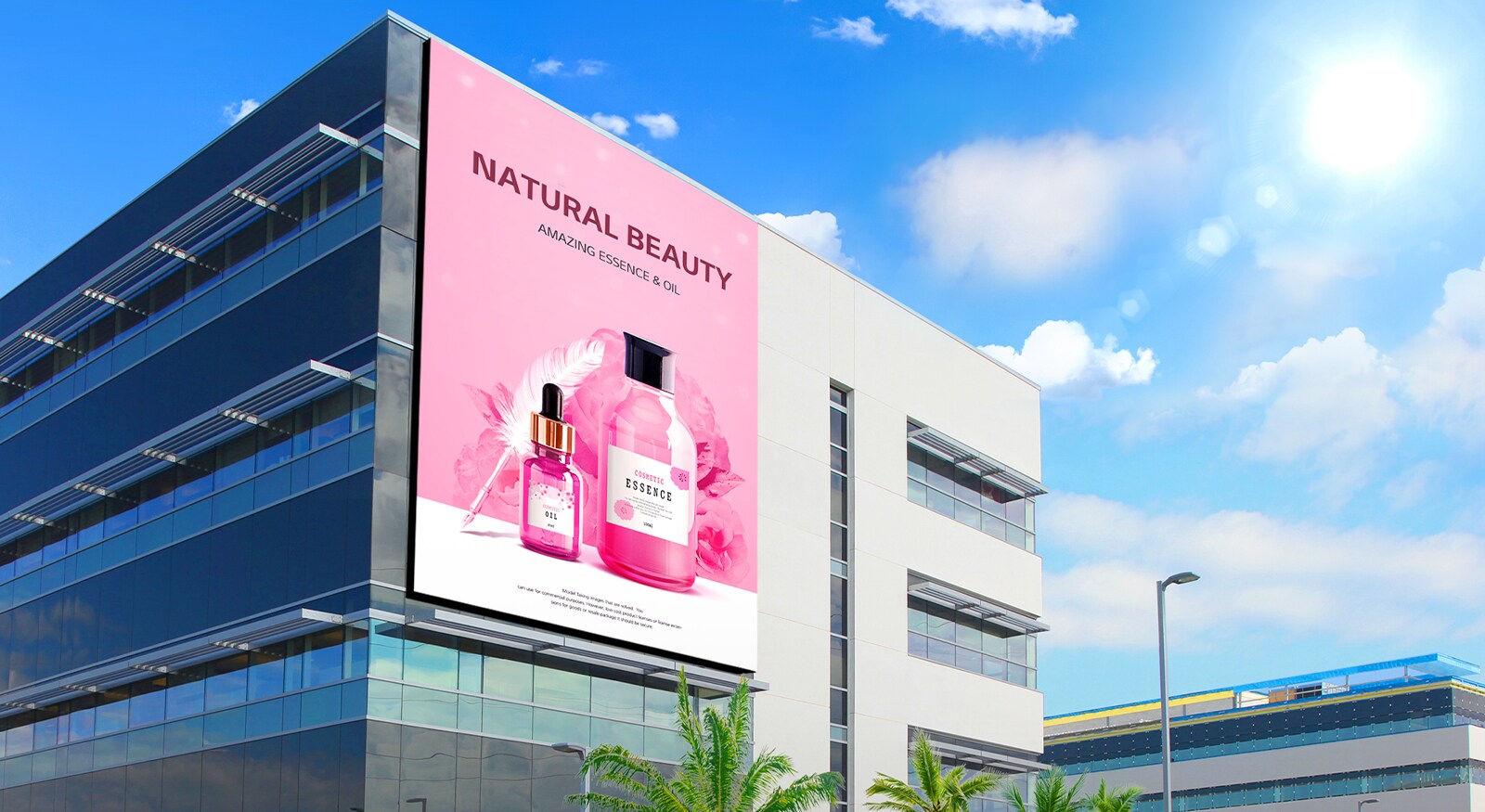 A large LED is installed on the building. The sun is shining brightly, but the LED screen’s advertisement is clearly visible.