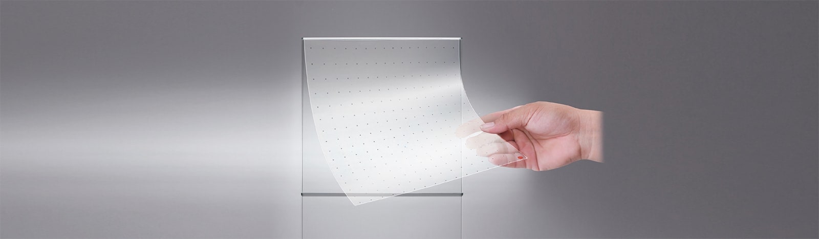 LG Transparent LED film is self-adhesive, so it can attach to the surface of the window easily.