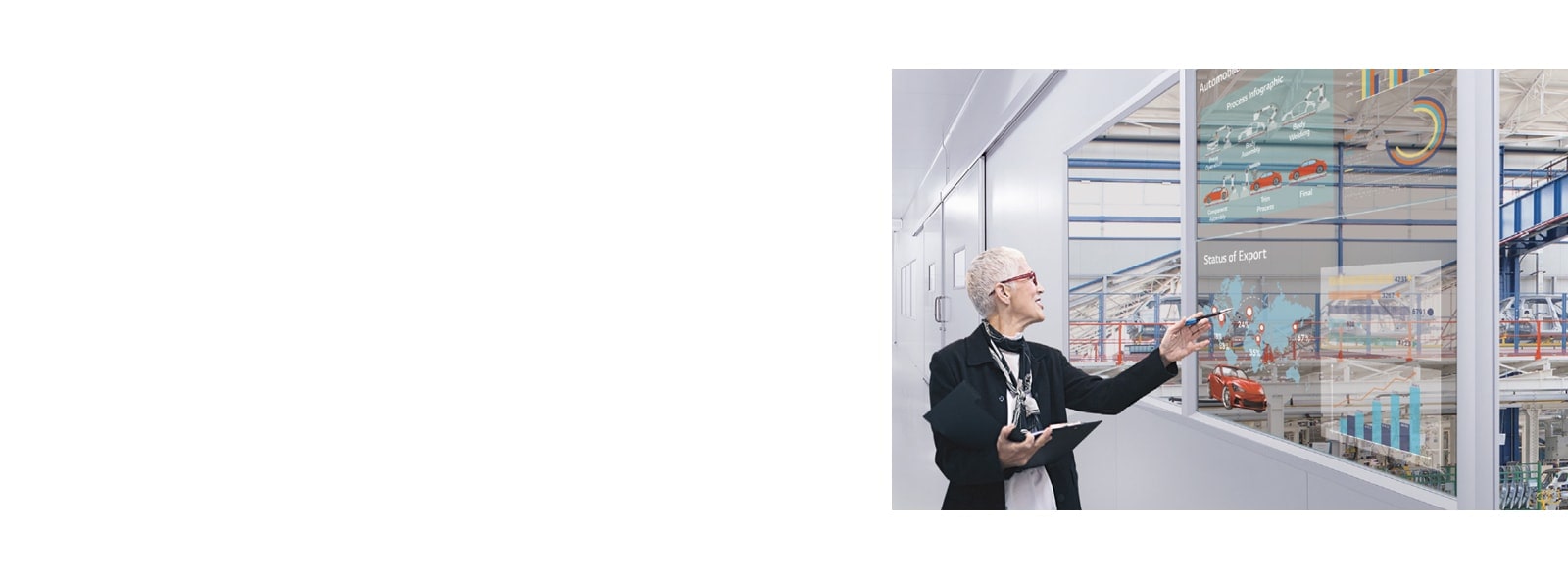 A woman understands her work by looking at the transparent display installed in the office's windows.