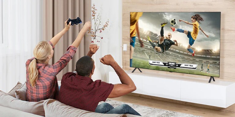 The man and woman are playing games, and the game's scene shown on the TV screen is realistically expressed.