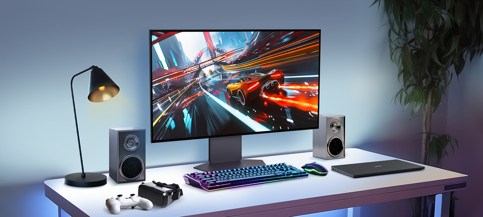 A 32-inch gaming oled monitor is positioned in the center of the desk, with various IT devices placed around it.