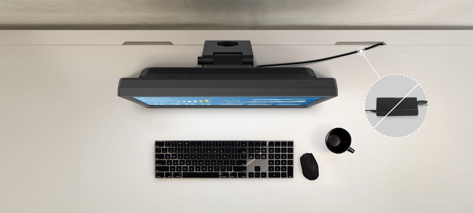 A clean and efficiently used desk because of LG SXGA touchscreen monitor with built-in power.	