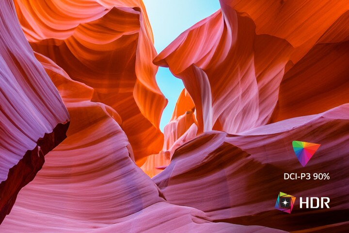 The screen contains various colors representing UHD 4K, and in the bottom left corner, there is a logo indicating HDR and DCI-P3 90%.	