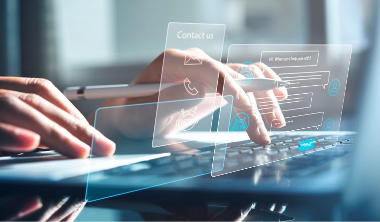 Hands are on a notebook interacting with a futuristic digital interface.